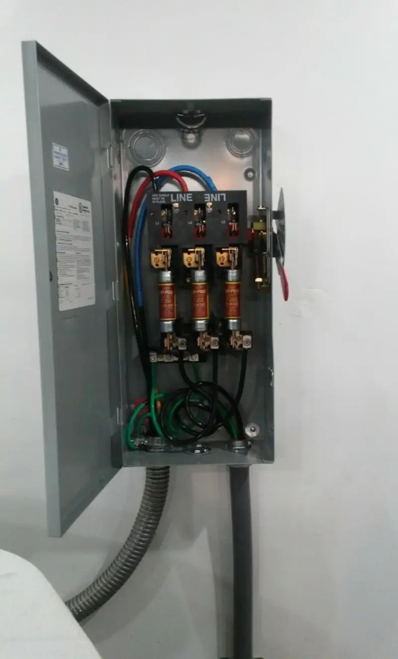 Three-phase disconnect switch installed for Smoke Detector Installation in Newton