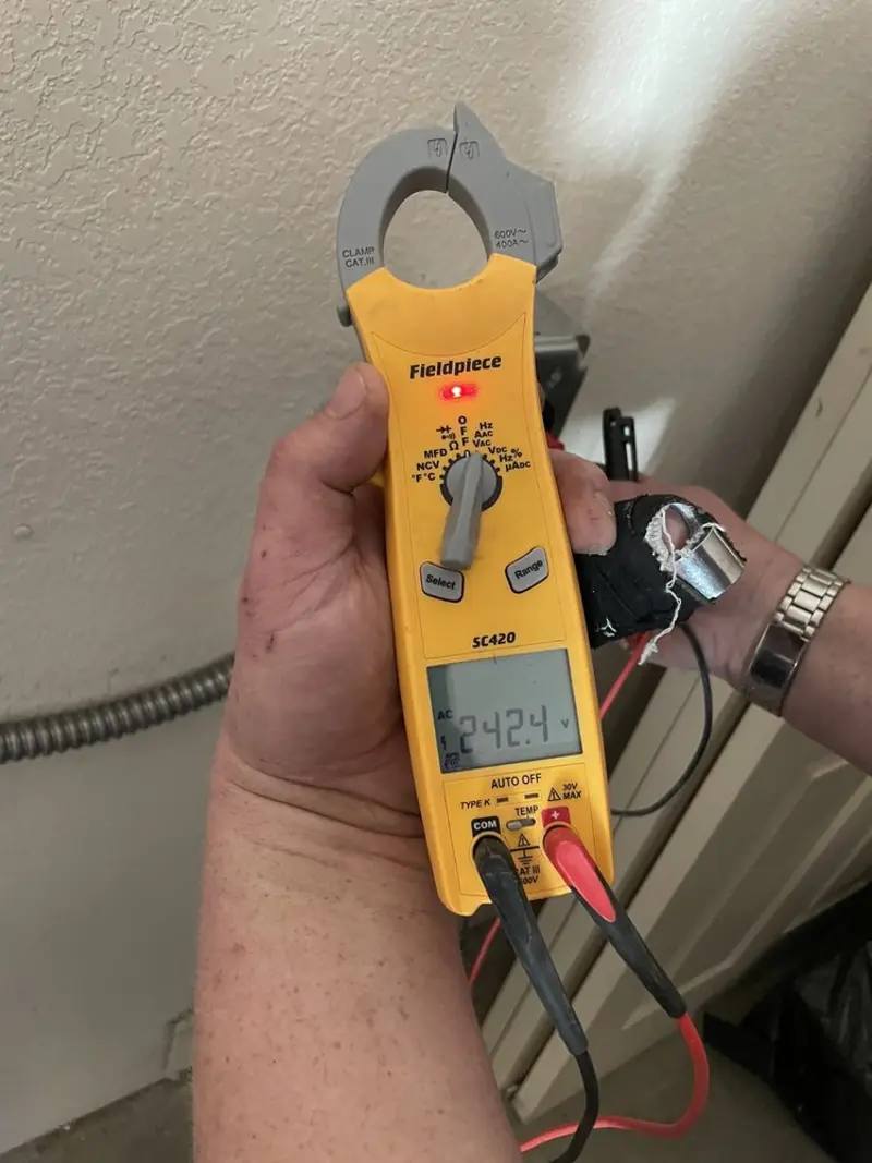 Voltage testing with clamp meter during Aluminum Wiring Replacement in Newton